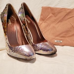 Miu Miu silver sequins heel pump.
